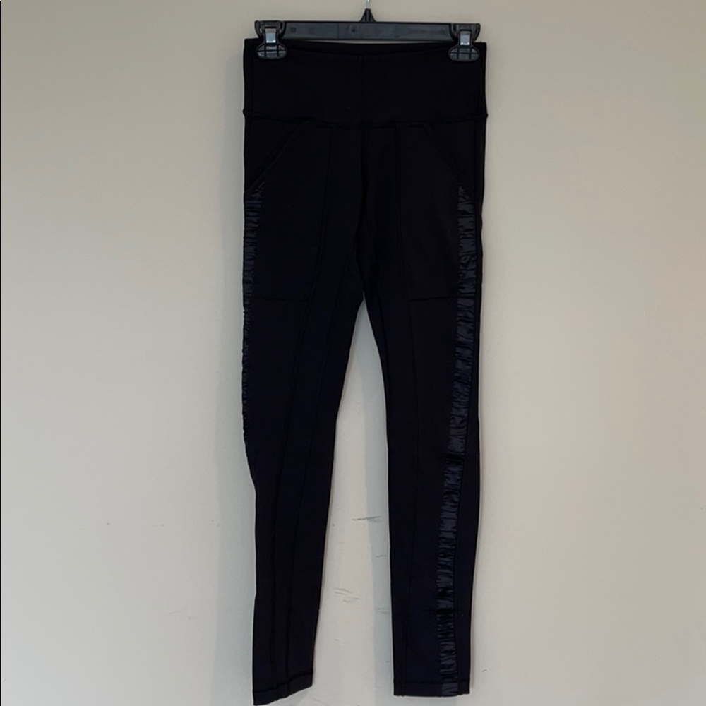 Lululemon ruched satin leggings.